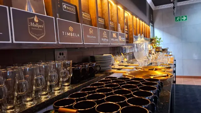 Glassware and coffee cups lined up on the refreshment bar of the Burgersfort boardroom