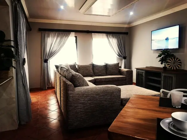 Comfortable shared lounge in a two-bedroom sharing apartment in Burgersfort